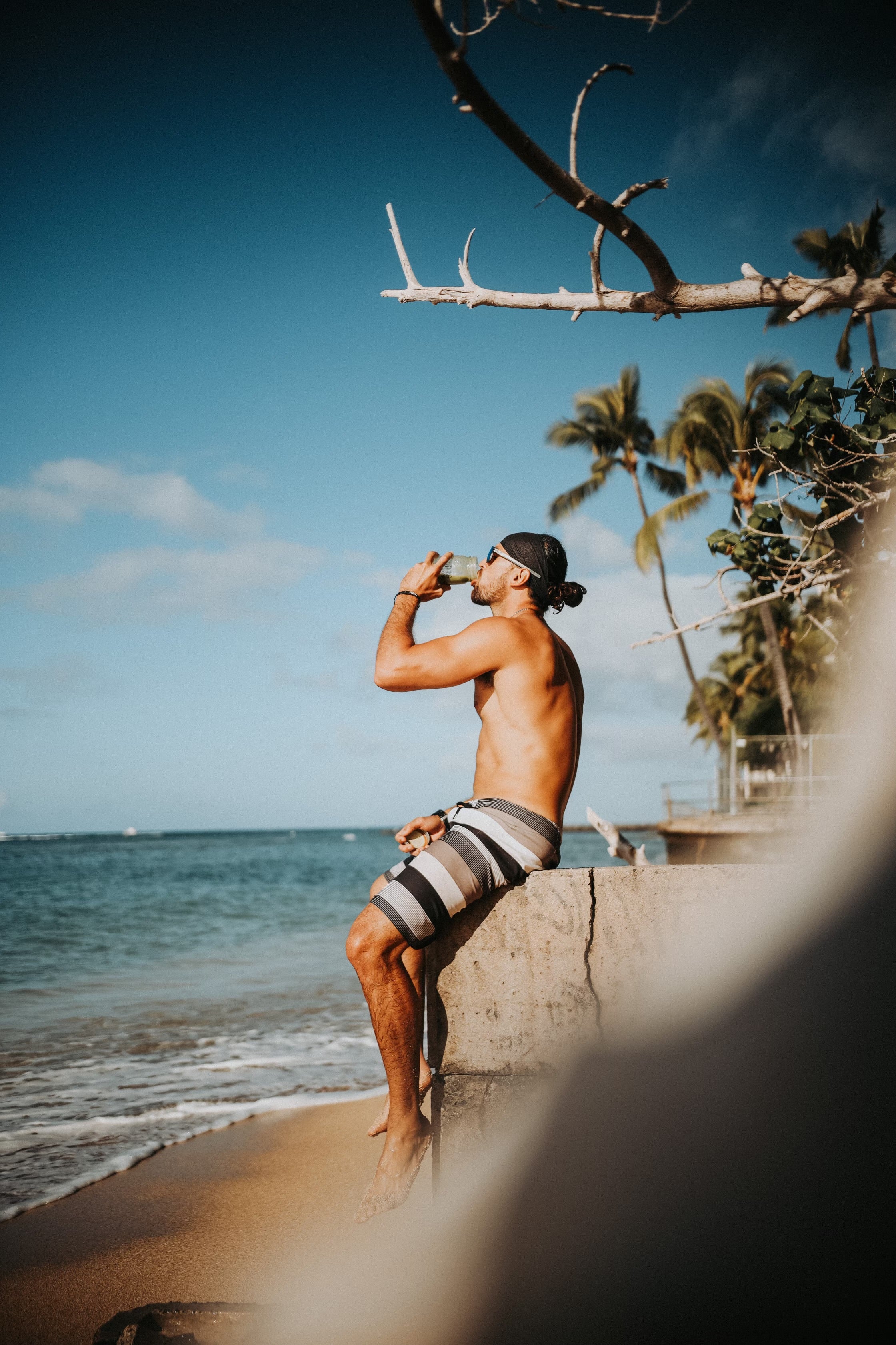 Breland enjoying a smoothie above the coast of Oʻahu