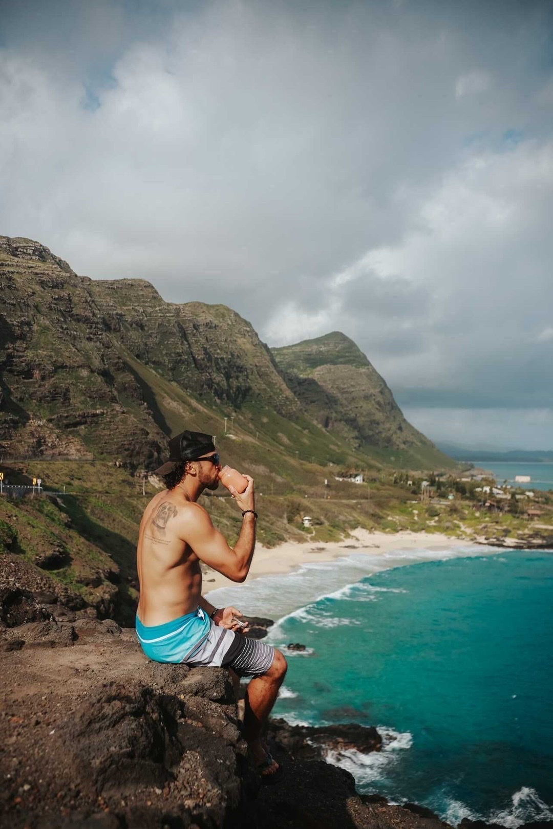 Breland enjoying a smoothie above the coast of Oʻahu